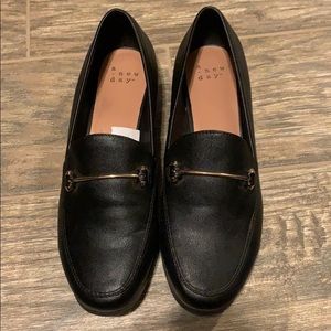 Black loafers